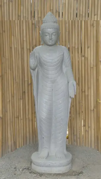 Product image of the product “Standing Buddha - Abhaya mudra made of Riverstone, ca. 175 cm High ”